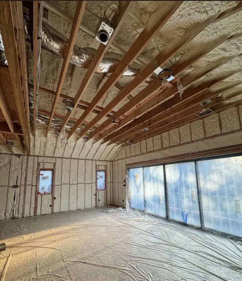 Interior walls and ceiling insulated with spray foam during new construction in Burley